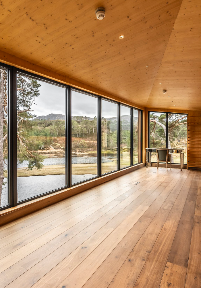 Shows a side view of one of the rooms inside the cabin